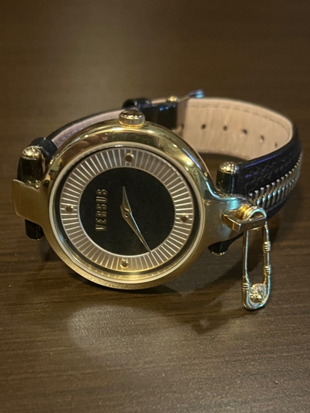 Versus Versace Black and Gold Women's Round Dial Watch with Charm Accent